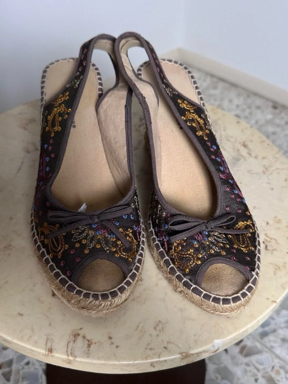 Brown embroidered wedge sandals with multicolored floral embroidery